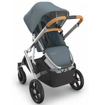 Uppababy Callum Vista V3 stroller in gray with a spacious seat, adjustable canopy, and wooden accents on the handle.