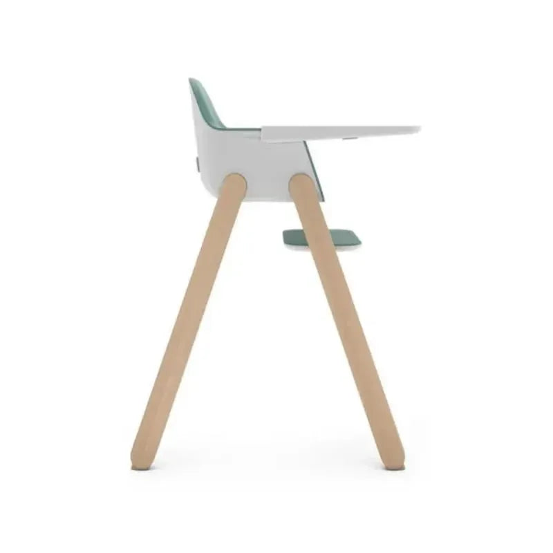 Uppababy Ciro Highchair in Emrick Spruce Green with wooden legs and a sleek design.