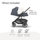 Uppababy Cruz V3 stroller in Dusty Blue Mélange with carbon frame and chestnut leather, showing included toddler seat and bumper bar.