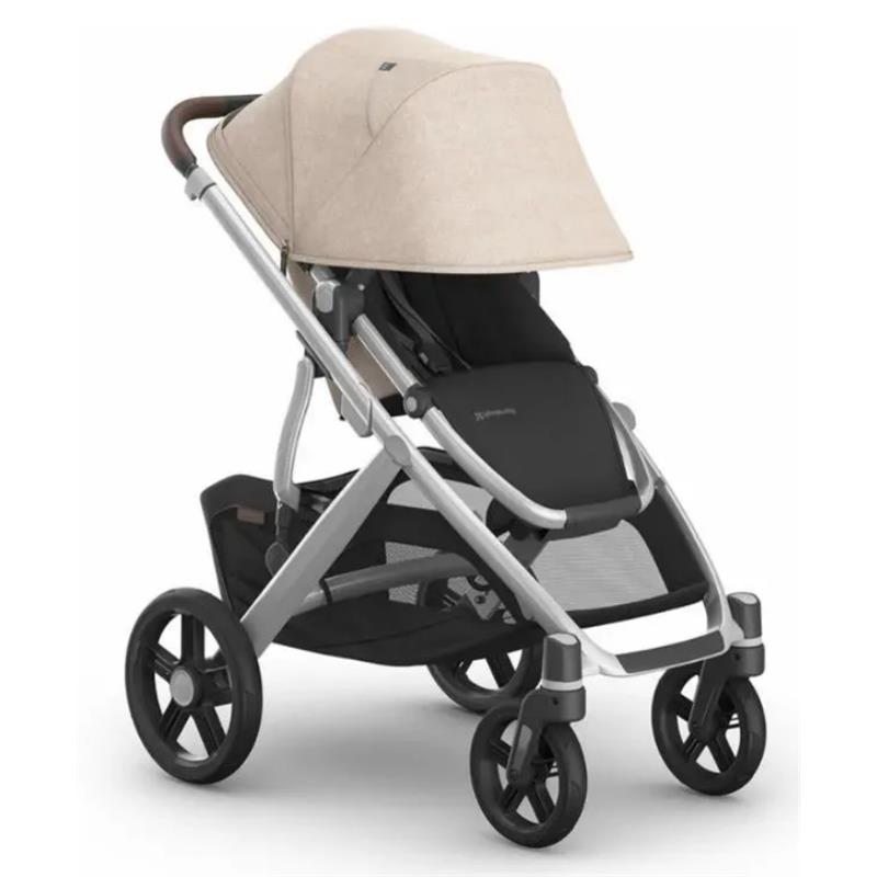 Uppababy Declan Vista V3 stroller featuring a beige canopy, black seat, and silver frame, designed for infant transport.