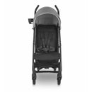 UPPAbaby G-LUXE Umbrella Stroller in Greyson with a charcoal melange canopy and a black seat featuring safety harness.