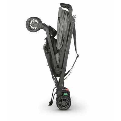 UPPAbaby G-LUXE Umbrella Stroller in Charcoal Melange, shown in a folded position for easy transport.