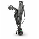 UPPAbaby G-LUXE Umbrella Stroller in Charcoal Melange, shown in a folded position for easy transport.