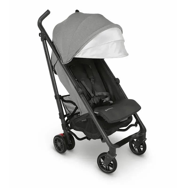 UPPAbaby G-LUXE umbrella stroller in Greyson color, featuring a gray canopy, adjustable harness, and lightweight frame.