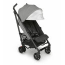 UPPAbaby G-LUXE umbrella stroller in Greyson color, featuring a gray canopy, adjustable harness, and lightweight frame.