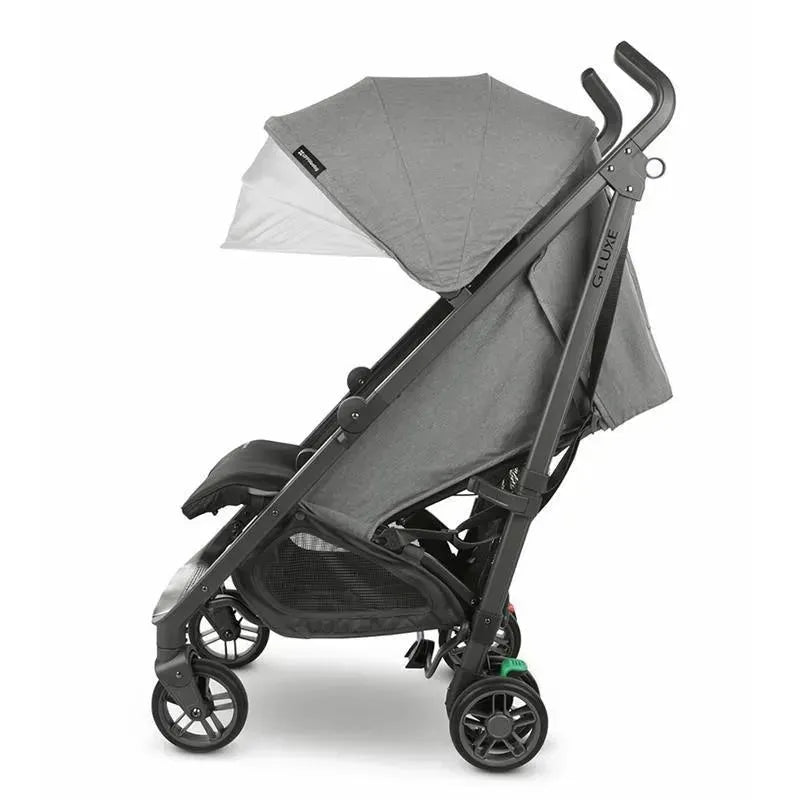 UPPAbaby G-LUXE Umbrella Stroller in Greyson color, featuring a charcoal melange fabric and a folding design.