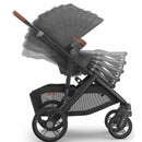 Uppababy Greyson Vista V3 stroller with adjustable canopy and upper adapters for Rumbleseat, showcasing sleek black design.