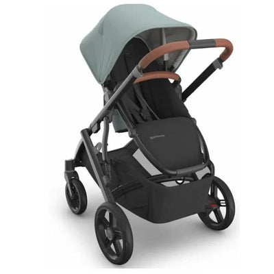 Uppababy Kenzi Vista V3 stroller with a mint canopy, brown handlebar, and a large storage basket.