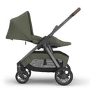 Uppababy Kona stroller in Meadow Green, featuring a sleek design with a large canopy and spacious storage basket.