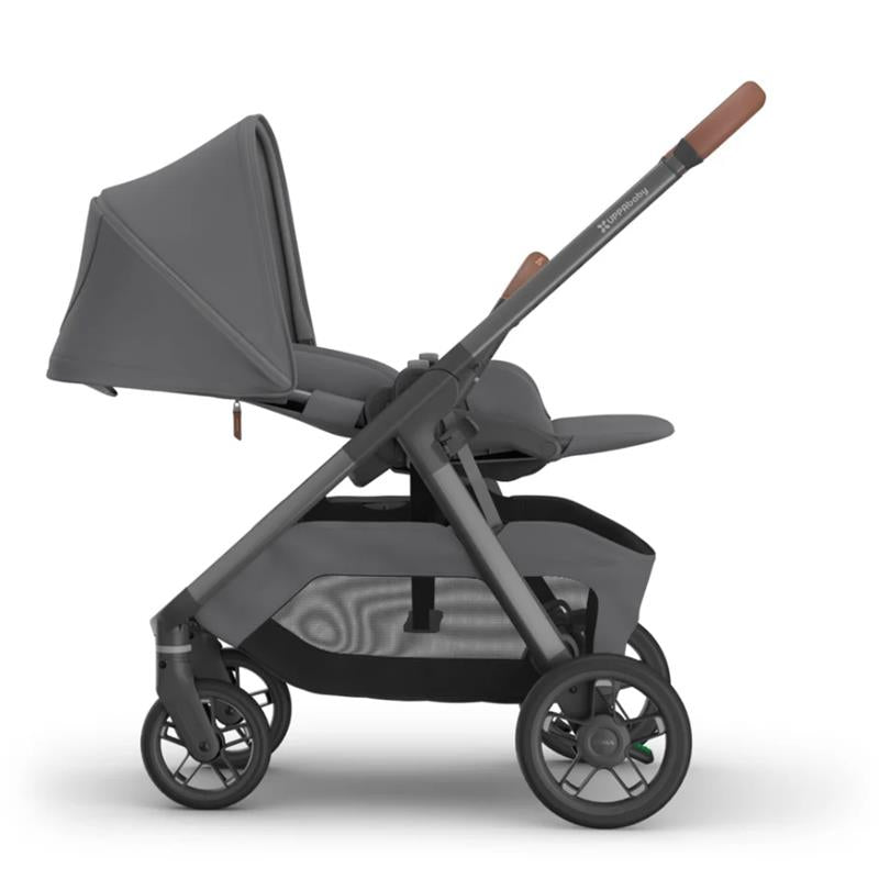 Uppababy Kona Stroller in Rowan Greyson, featuring a reclining seat, protective canopy, and spacious storage basket.