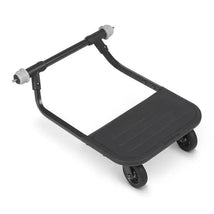 Uppababy Piggyback for Ridge stroller board, featuring a sleek black platform and two sturdy wheels for easy attachment.