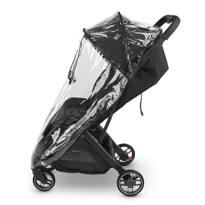 Clear rain shield designed for the Uppababy Minu V3 stroller, protecting the child from rain and wind.