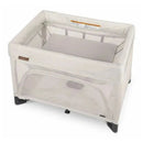 Uppababy Remi Playard in Charlie (Sand Mélange) featuring mesh sides and a soft, padded sleeping surface.