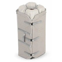 Uppababy Remi Playard in Charlie (Sand Mélange) with a lightweight, textured fabric and secure closure straps.