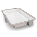 UPPAbaby Remi V2 Playard in Townsend Beige soft knit, featuring a spacious white interior with padded edges.