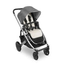 Reversible seat liner for Uppababy stroller in light grey with cozy sherpa fleece, featuring a padded design and adjustable straps.