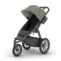 UPPAbaby Ridge V2 Jogging Stroller in Meadow Green with a carbon frame, featuring a large canopy and adjustable seating.