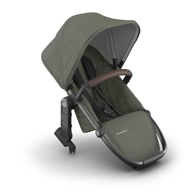 Uppababy Rumbleseat V3 in Meadow Green with graphite frame and chestnut leather handle, designed for infants and toddlers.