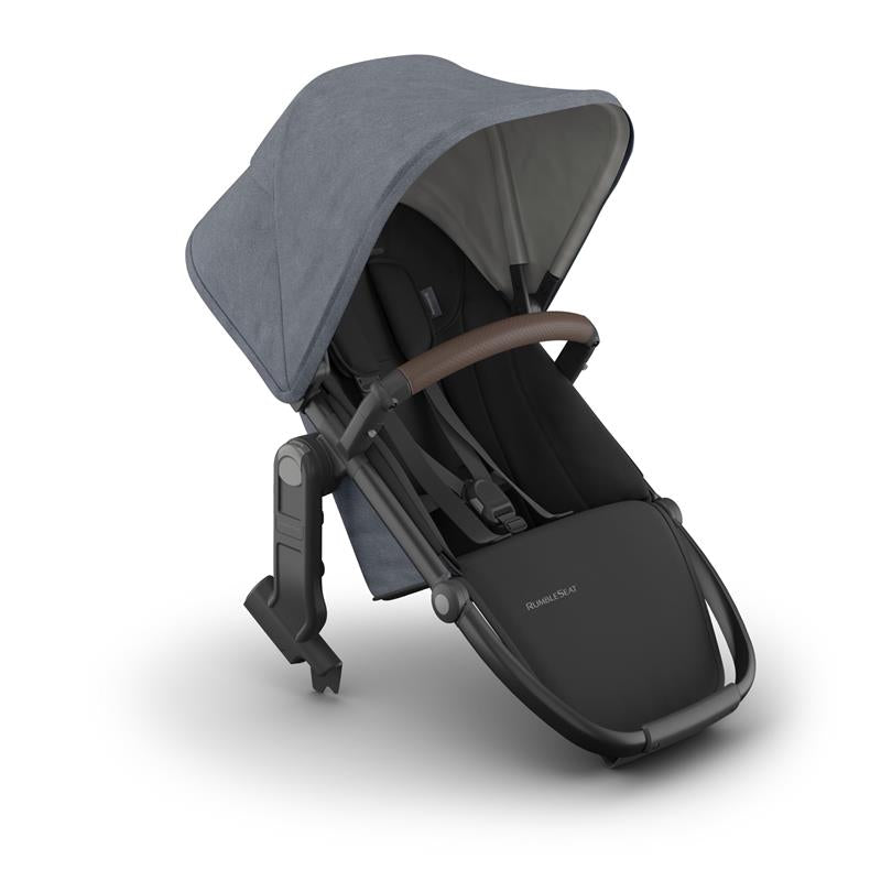 Uppababy Rumbleseat V3 in Dusty Blue Mélange with a carbon frame and chestnut leather handles, positioned upright.