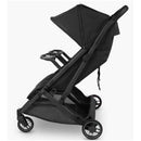 Uppababy Minu Duo stroller in black, featuring two seating positions and a compact design.