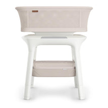 Uppababy Soma Smart Bassinet in Charlie color, featuring a breathable mesh top and a storage basket below.