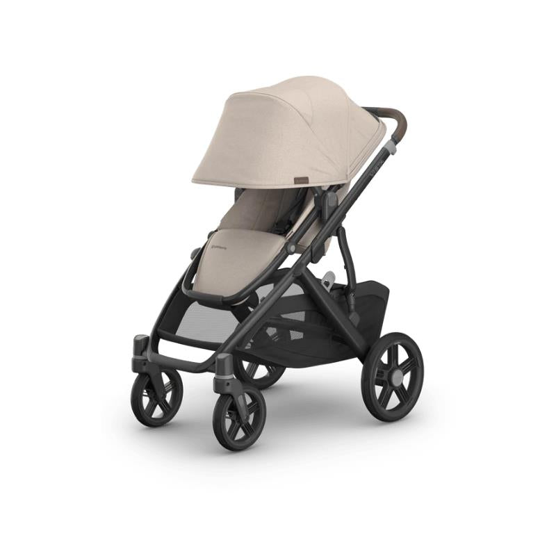 Uppababy Vista V3 stroller in Ada Sandstone Melange with chestnut leather details, featuring a large canopy and spacious storage.