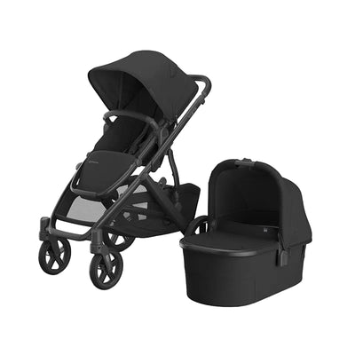 Uppababy Vista V3 stroller in black, with a matching bassinet, showcasing a modern design and adjustable features.