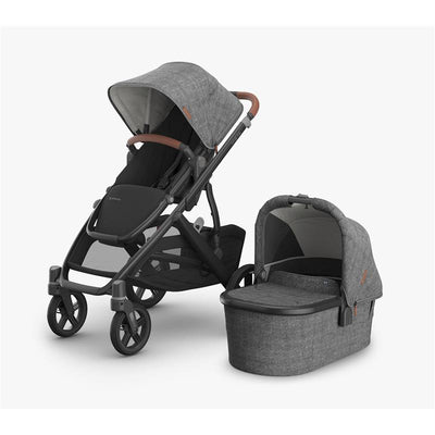 Uppababy Vista V3 stroller in Greyson color with matching bassinet, featuring a grey fabric and black frame.