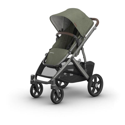 Uppababy Vista V3 stroller in Meadow Green with a graphite frame and chestnut leather accents.