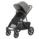 Uppababy Vista V3 stroller in Greyson color with a charcoal mélange canopy, carbon frame, and saddle leather accents.