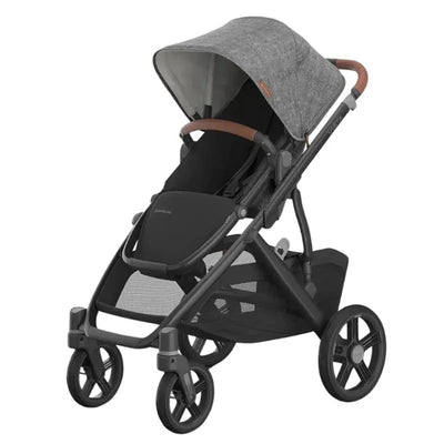 Uppababy Vista V3 stroller in Greyson color with a charcoal mélange canopy, carbon frame, and saddle leather accents.
