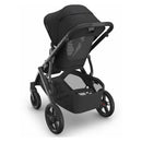 Uppababy Vista V3 stroller in Jake colorway, featuring a charcoal carbon frame and black leather accents.