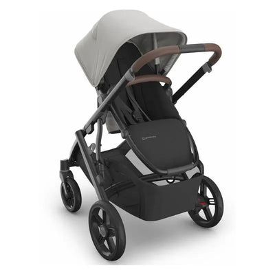 Uppababy Vista V3 stroller in Savannah color with pearl gray fabric, carbon frame, and chestnut leather handles.
