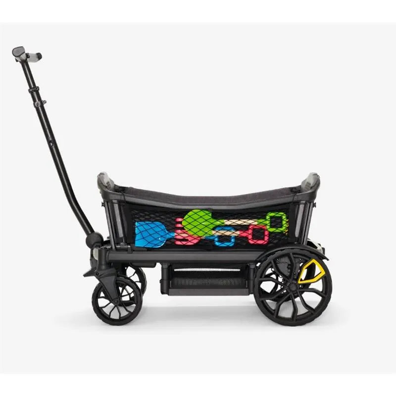 Cargo net storage attachment for Veer wagon, displaying colorful toy shovels and buckets in a mesh compartment.