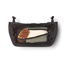 Rear foldable storage basket for Veer All-Terrain Cruiser, featuring compartments with a pine cone and a blanket.