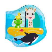 Vulli Bath Gift Set featuring Sophie the Giraffe, a frog, and a rubber duck on a colorful boat with playful sea animals.