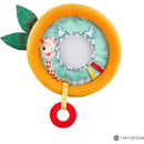 Colorful soft toy featuring a smiling giraffe and a circular fabric mirror, designed for infants.