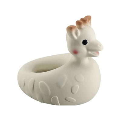 Vulli Sophie La Giraffe So Pure Bath Toy, a soft rubber giraffe-shaped bath toy in pale colors, suitable for children.