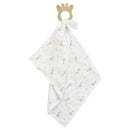 Teething ring shaped like a giraffe attached to a white swaddle with gold patterns of giraffes and stars.