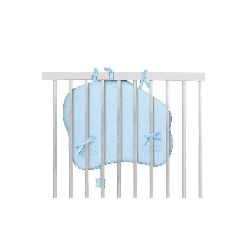 Blue Vulli Touch & Play Board secured to crib bars, featuring rounded edges and ties for safety.