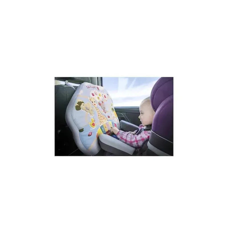 Child interacting with the Vulli Touch & Play Board in a car, featuring a colorful giraffe design and engaging activities.