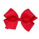 Red grosgrain hair bow for baby girls, featuring a classic design with a large, stylish knot in the center.