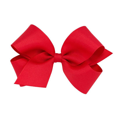 Red grosgrain hair bow for baby girls, featuring a classic design with a large, stylish knot in the center.
