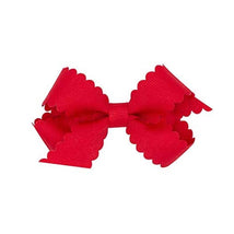 Classic medium red grosgrain hair bow with scalloped edges, perfect for adding a stylish touch to hair.