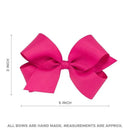Medium pink satin hair bow measuring 5 inches wide and 3 inches tall, secured with a WeeStay clip.