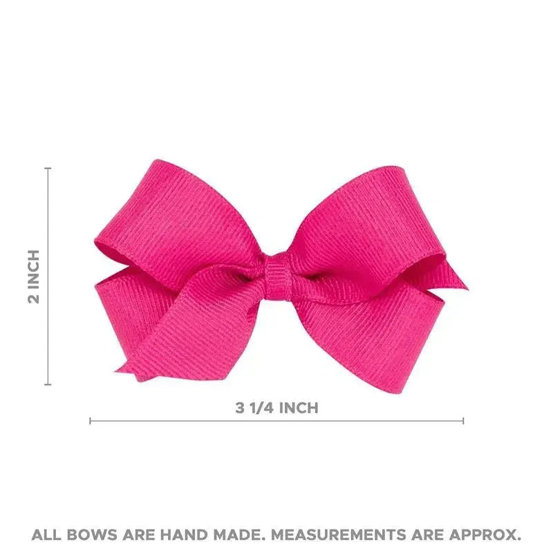Classic French satin hair bow in bright pink on a WeeStay clip, measuring approximately 3.25 inches wide and 2 inches high.