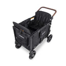 Wonderfold W4 Luxe Pro Quad Stroller in Jet Black designed to seat up to four children, featuring a spacious interior and safety harnesses.