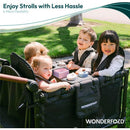 Wonderfold Flex Snack Tray for W1/W2 with children seated, enjoying snacks, and smiling in a stroller setting outdoors.