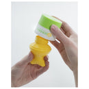 Yaya Organics Sun-Easy Sunscreen Applicator, a yellow fish-tail bottle being opened, revealing contents inside.