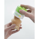 Yaya Organics Sun-Easy Sunscreen Applicator in teddy bear shape, held by a hand, demonstrating sunscreen application.
